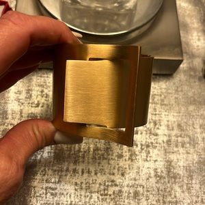 Gold buckle cuff bracelet bought in a boutique